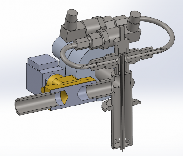 Sectional view of the coupling. It can be seen how the thermocouple goes all the way through and ends in the tank. Likewise, it is seen how the gas is blown out radially through the small holes, so as not to mix the liquid and gas unnecessarily during pressurizing. This is only important in the LOX tank.