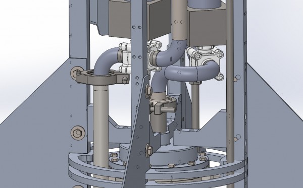 The LOX dome is supported by four brackets, which is mounted on separate longitudinal metal rods. Again you can see how Tri-clamp fittings are used for connections. The main valves are also seen as the square bellhousings between valves and servo gear.
